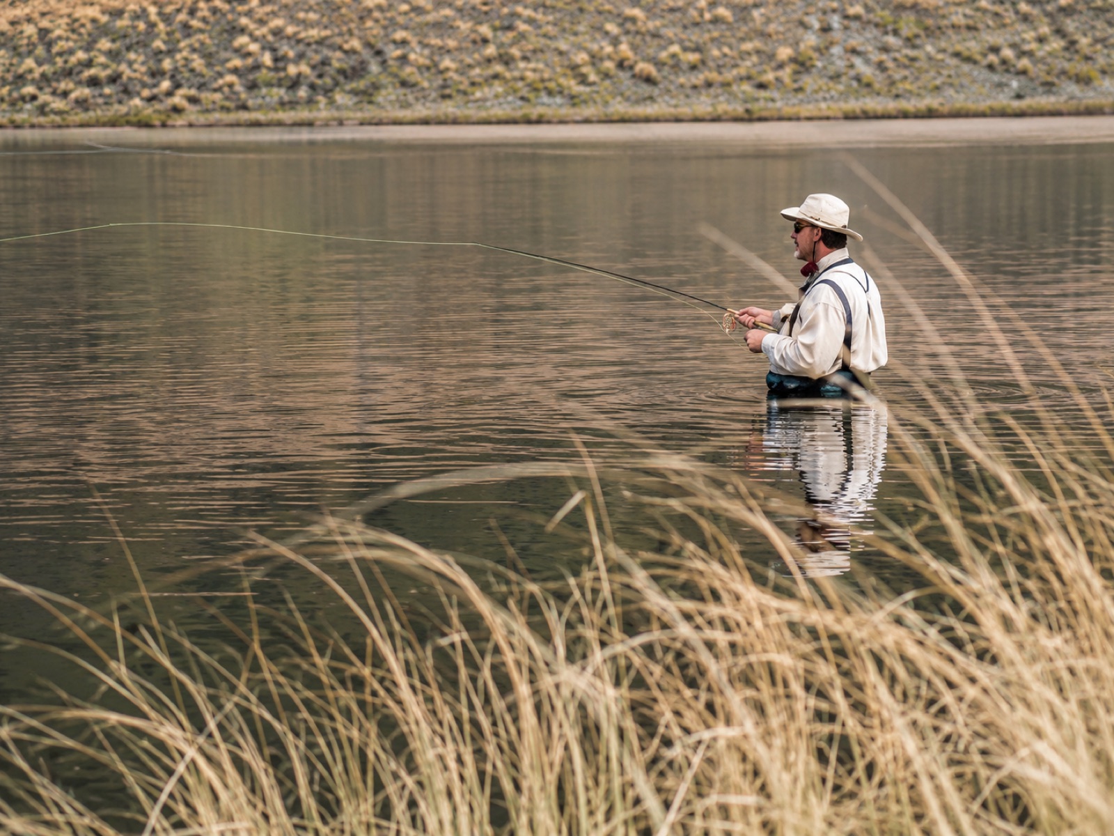 Fly fishing a high-country tarn at Mesopotamia Station